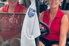 Two-ladies-in-golf-cart-750