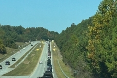 Line-of-jeeps-on-hill