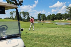 Golfer-hitting-a-ball-750