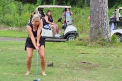 Lady-golfer-with-no-shoes-750